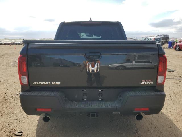 Photo 6 from auction – 2023 HONDA RIDGELINE with VIN 5FPYK3F19PB047626