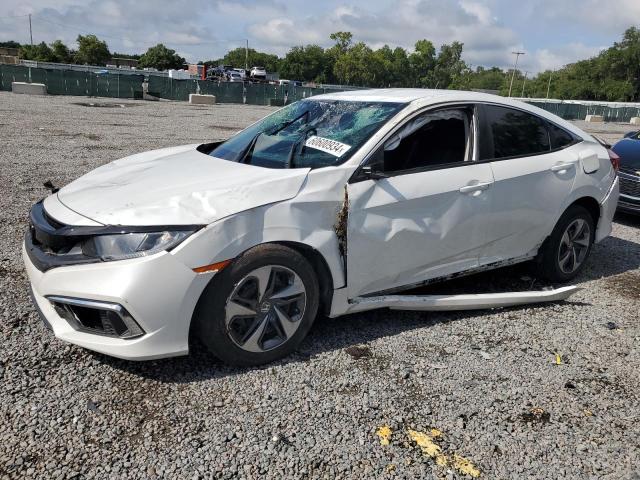 HONDA CIVIC LX 2020 with VIN 19XFC2F60LE018048 - Photo from auction