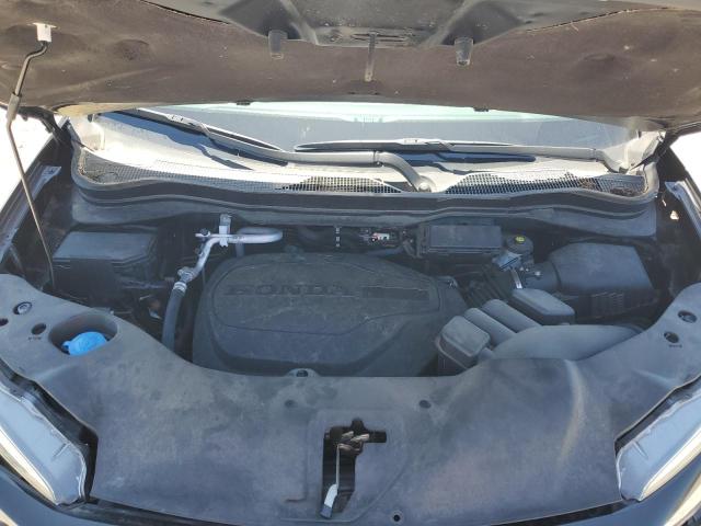 Photo 12 from auction – 2020 HONDA PASSPORT E with VIN 5FNYF8H57LB017013