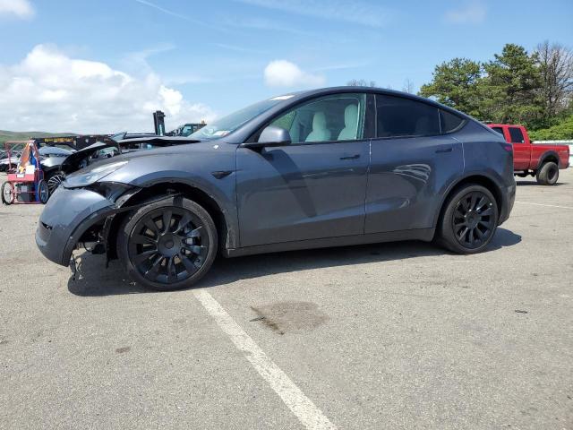 TESLA MODEL Y 2022 with VIN 7SAYGAEE8NF508317 - Photo from auction