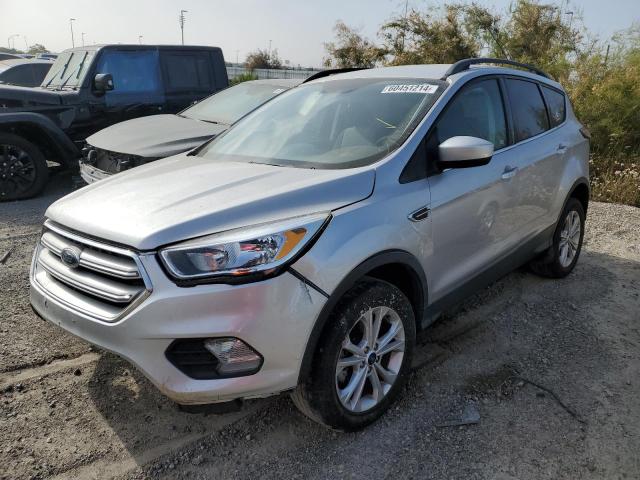 FORD ESCAPE SE 2018 with VIN 1FMCU0GD1JUD44467 - Photo from auction
