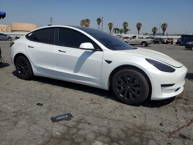 Photo 4 from auction – 2022 TESLA MODEL 3 with VIN 5YJ3E1EB0NF128357