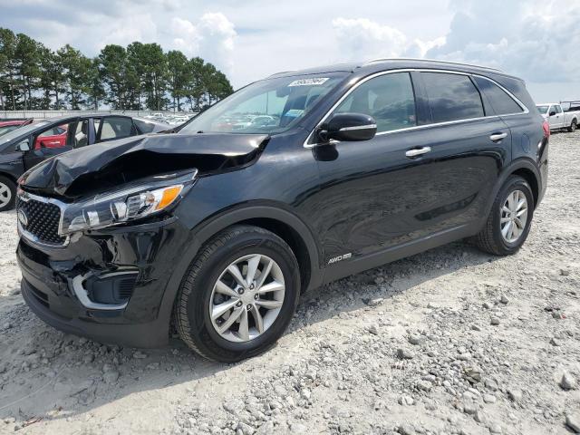 KIA SORENTO LX 2016 with VIN 5XYPGDA54GG111165 - Photo from auction