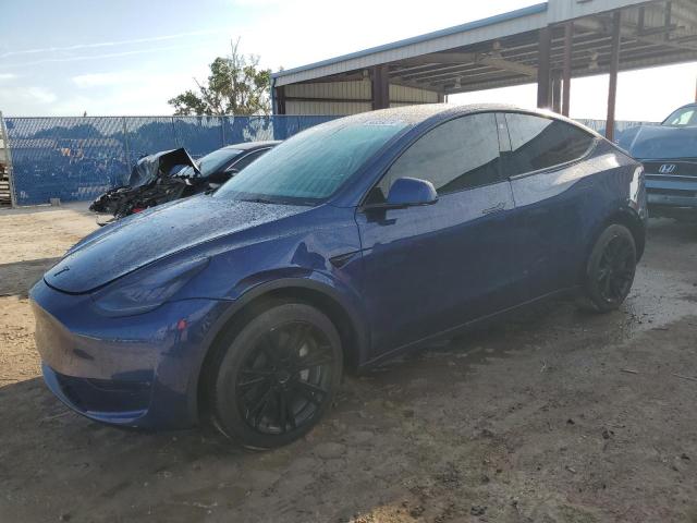 TESLA MODEL Y 2023 with VIN 7SAYGDEE4PA087665 - Photo from auction