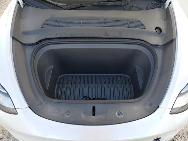 Photo 12 from auction – 2023 TESLA MODEL Y with VIN 7SAYGDEEXPA128641