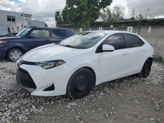 TOYOTA COROLLA L 2019 with VIN 2T1BURHE5KC212080 - Photo from auction