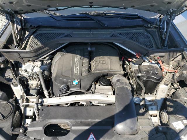 Photo 11 from auction – 2014 BMW X5 SDRIVE3 with VIN 5UXKR2C53E0H32357