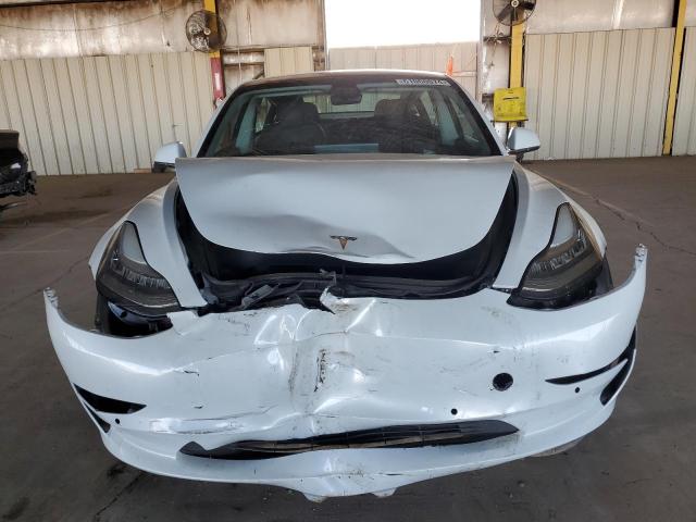 Photo 5 from auction – 2018 TESLA MODEL 3 with VIN 5YJ3E1EA5JF053706