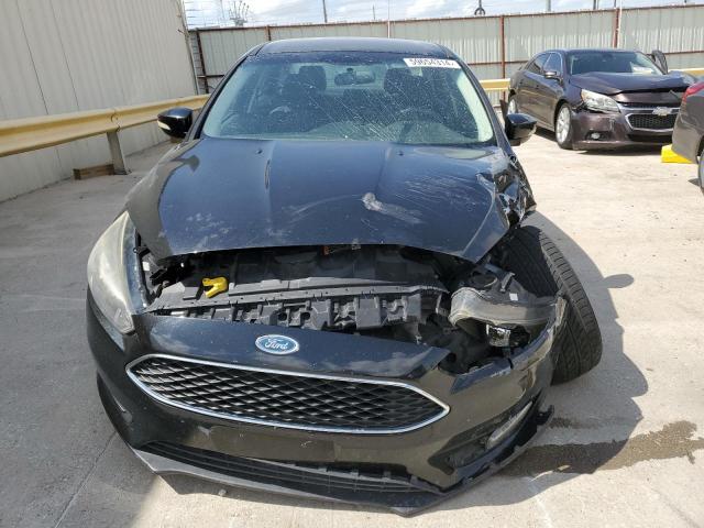 Photo 5 from auction – 2015 FORD FOCUS SE with VIN 1FADP3F28FL384534