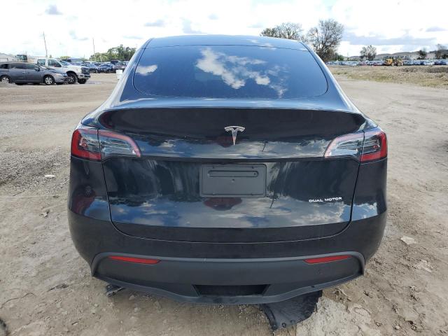 Photo 6 from auction – 2023 TESLA MODEL Y with VIN 7SAYGAEE6PF805461