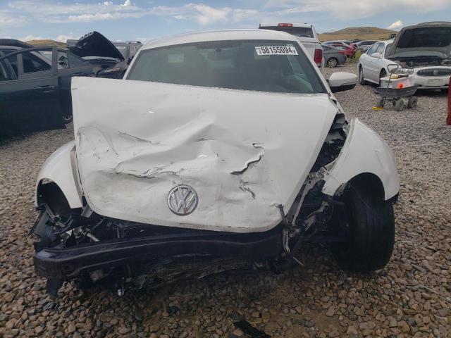 Photo 5 from auction – 2013 VOLKSWAGEN BEETLE with VIN 3VWJX7AT7DM692131