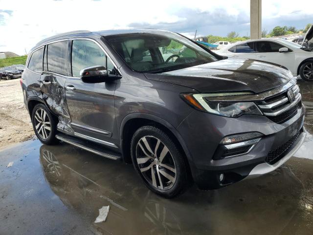 Photo 4 from auction – 2016 HONDA PILOT ELIT with VIN 5FNYF6H0XGB042258