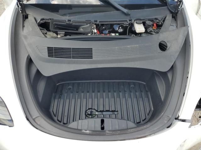 Photo 11 from auction – 2022 TESLA MODEL 3 with VIN 5YJ3E1EBXNF234931