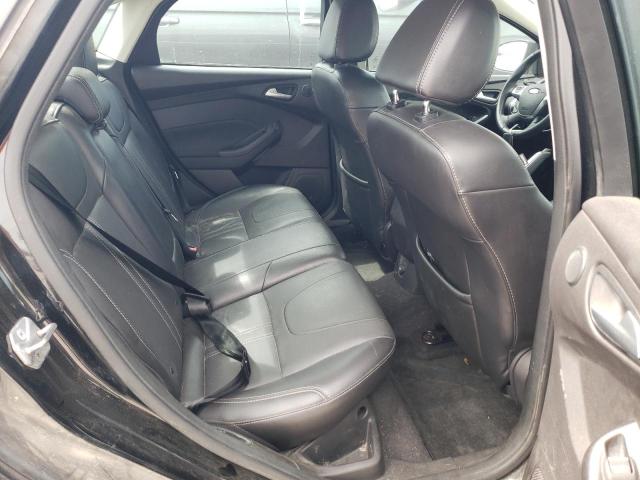 Photo 10 from auction – 2014 FORD FOCUS TITA with VIN 1FADP3J25EL165262