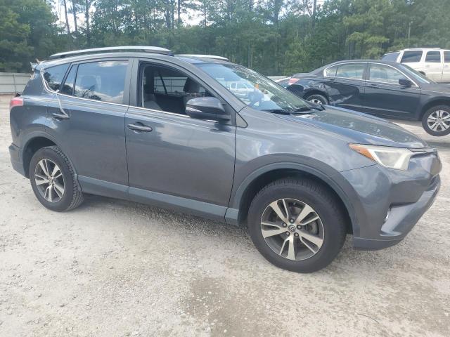 Photo 4 from auction – 2017 TOYOTA RAV4 XLE with VIN JTMWFREV3HD098804