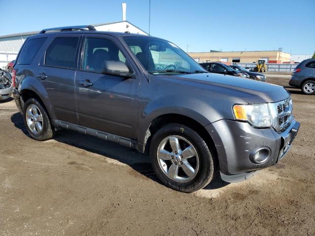 Photo 4 from auction – 2011 FORD ESCAPE LIM with VIN 1FMCU9EG4BKB41278