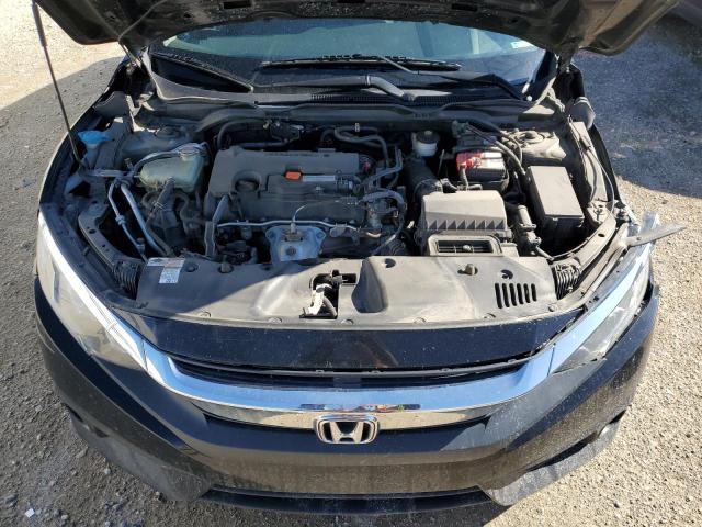 Photo 11 from auction – 2018 HONDA CIVIC LX with VIN 2HGFC2F66JH020051