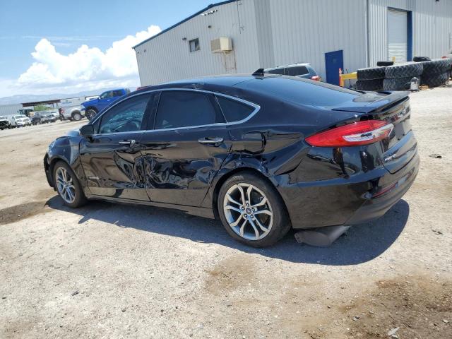 Photo 2 from auction – 2019 FORD FUSION TIT with VIN 3FA6P0RU4KR104236