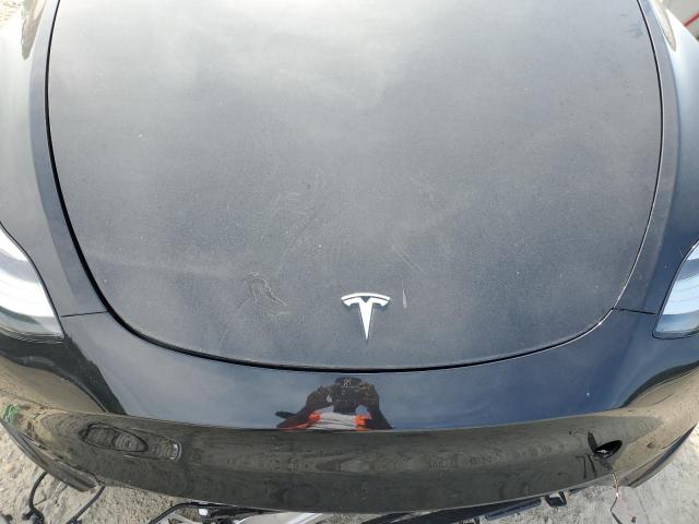 Photo 11 from auction – 2023 TESLA MODEL Y with VIN 7SAYGDEE3PA153705