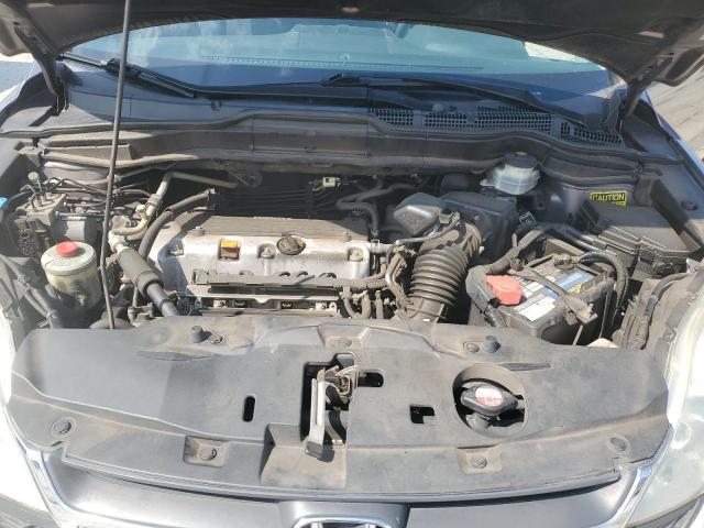 Photo 12 from auction – 2011 HONDA CR-V LX with VIN 5J6RE3H39BL028545