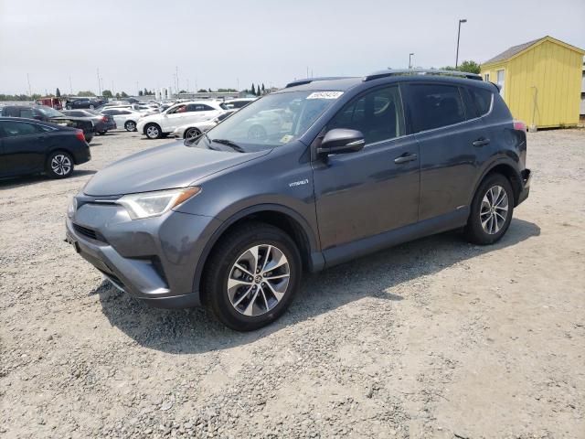 TOYOTA RAV4 HV LE 2018 with VIN JTMRJREV9JD240297 - Photo from auction