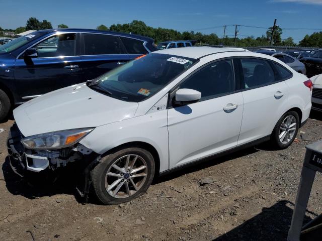 FORD FOCUS SE 2018 with VIN 1FADP3F2XJL276358 - Photo from auction