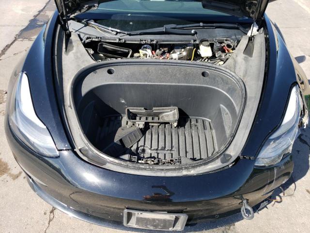 Photo 11 from auction – 2022 TESLA MODEL 3 with VIN 5YJ3E1EB8NF304894