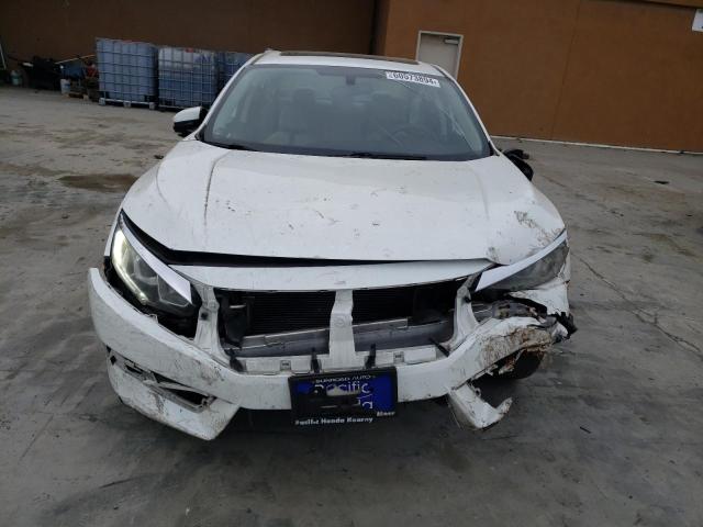 Photo 5 from auction – 2018 HONDA CIVIC EX with VIN 2HGFC2F76JH552439