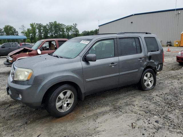 HONDA PILOT EXL 2011 with VIN 5FNYF3H5XBB031263 - Photo from auction