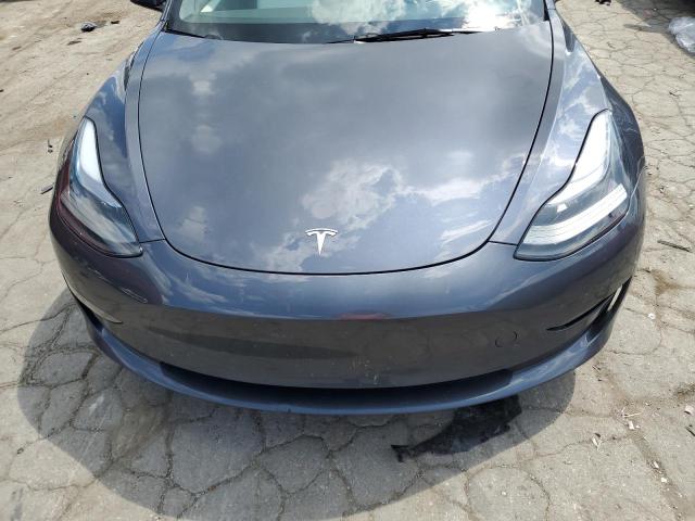 Снимка 11 от търг – 2023 TESLA MODEL 3 с VIN 5YJ3E1EA1PF712910