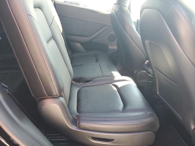 Photo 10 from auction – 2023 TESLA MODEL Y with VIN 7SAYGAEE9PF695067