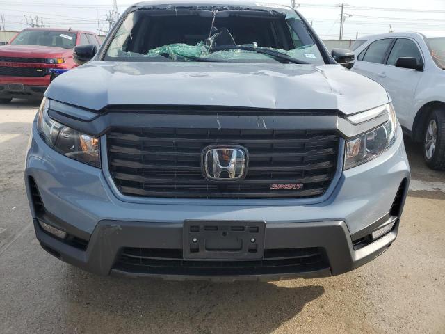 Photo 5 from auction – 2023 HONDA RIDGELINE with VIN 5FPYK3F15PB039989