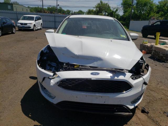 Photo 5 from auction – 2018 FORD FOCUS SE with VIN 1FADP3K2XJL305041