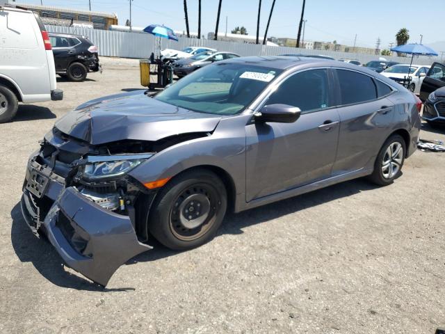 HONDA CIVIC LX 2018 with VIN 2HGFC2F59JH601972 - Photo from auction