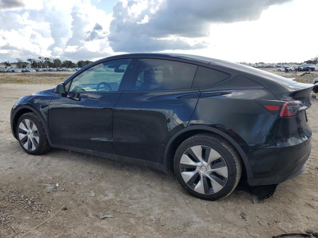 Photo 2 from auction – 2023 TESLA MODEL Y with VIN 7SAYGAEE6PF805461