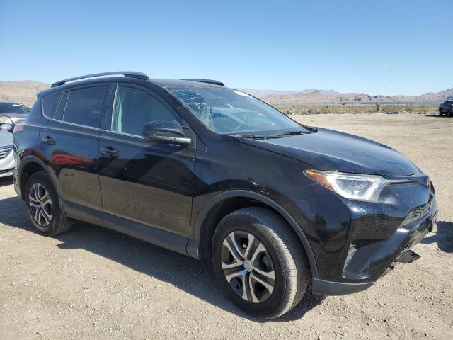 Photo 4 from auction – 2018 TOYOTA RAV4 LE with VIN 2T3BFREV6JW832844