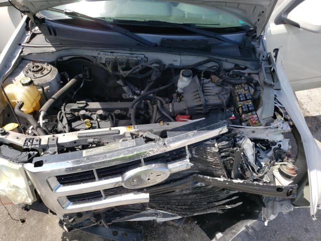 Photo 12 from auction – 2009 FORD ESCAPE LIM with VIN 1FMCU04799KB26413