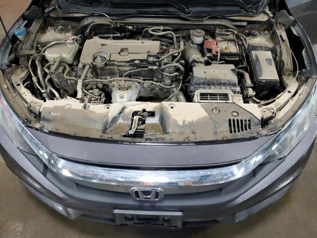 Photo 11 from auction – 2016 HONDA CIVIC LX with VIN 2HGFC2F59GH500665