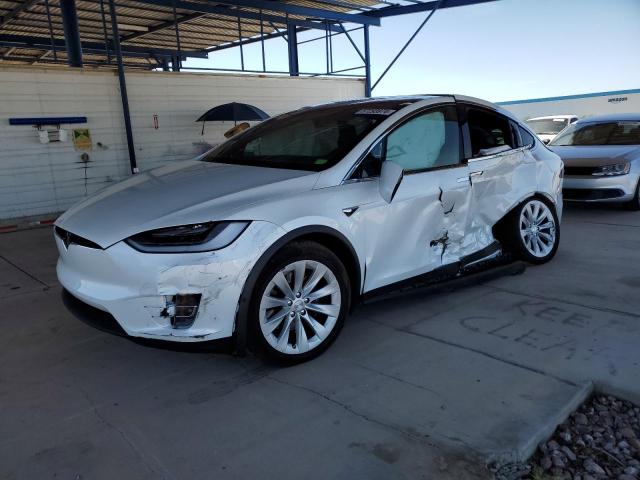 TESLA MODEL X 2019 with VIN 5YJXCDE21KF203877 - Photo from auction