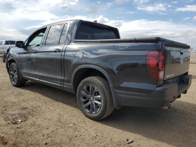 Photo 2 from auction – 2023 HONDA RIDGELINE with VIN 5FPYK3F19PB047626