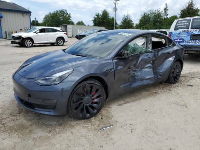TESLA MODEL 3 2022 with VIN 5YJ3E1EC0NF261869 - Photo from auction