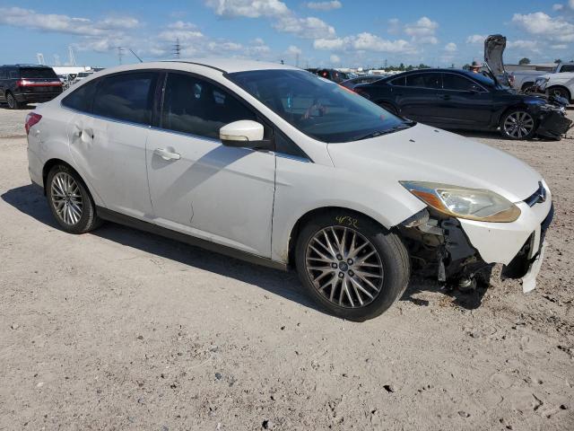 Foto 4 de la subasta – 2012 FORD FOCUS SEL con VIN 1FAHP3H29CL466430