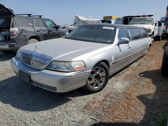 LINCOLN TOWN CAR E 2009 with VIN 2L1FM88W59X633398 - Photo from auction