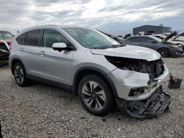 Photo 4 from auction – 2015 HONDA CR-V TOURI with VIN 5J6RM4H97FL801838