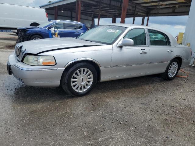LINCOLN TOWN CAR E 2003 with VIN 1LNHM81W13Y690755 - Photo from auction