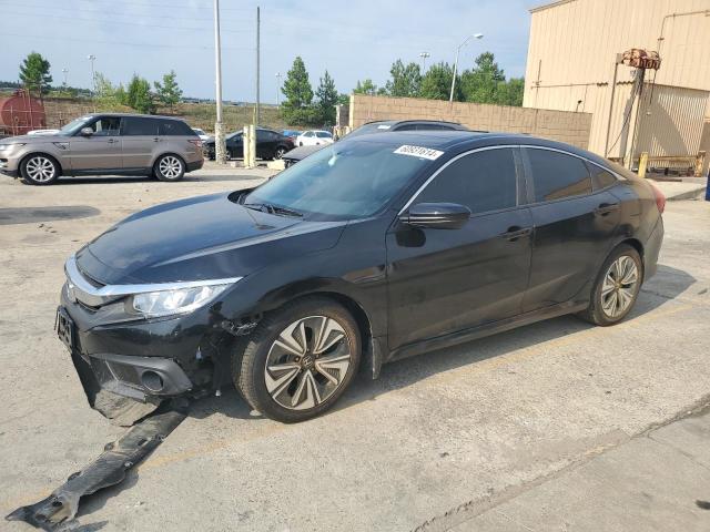 HONDA CIVIC EX 2018 with VIN JHMFC1F47JX042951 - Photo from auction