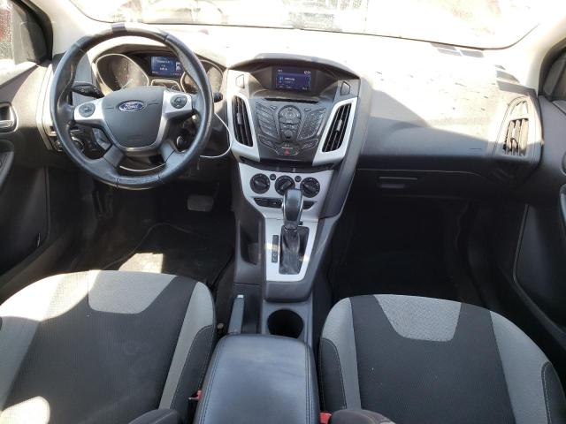 Foto 8 de la subasta – 2014 FORD FOCUS SE con VIN 1FADP3K29EL244772