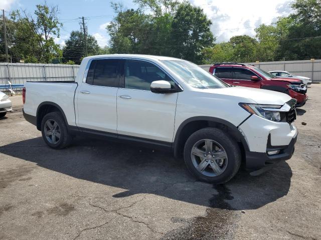 Photo 4 from auction – 2021 HONDA RIDGELINE with VIN 5FPYK3F79MB023956