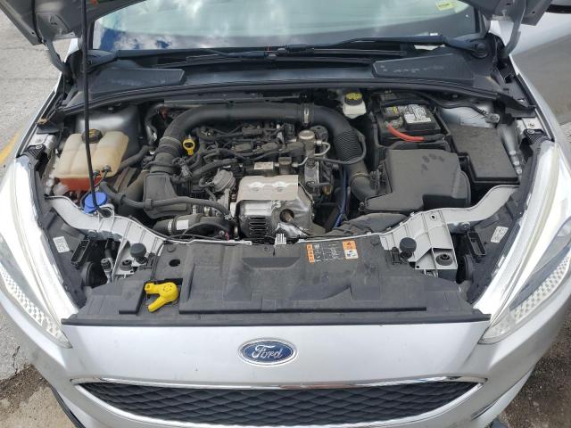Photo 11 from auction – 2018 FORD FOCUS SE with VIN 1FADP3FE1JL310438