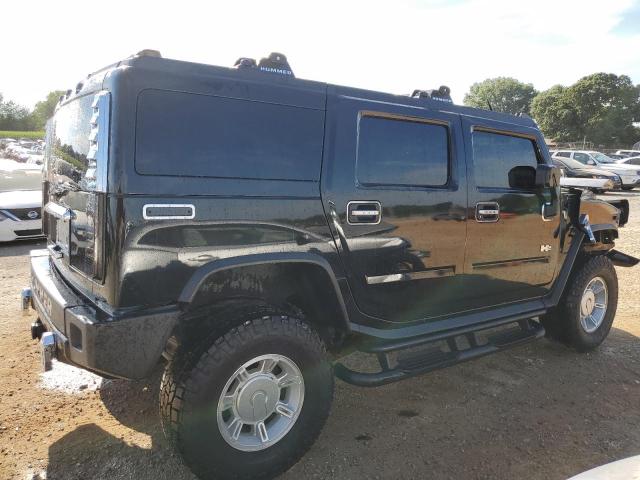 Photo 3 from auction – 2003 HUMMER H2 with VIN 5GRGN23U13H104057